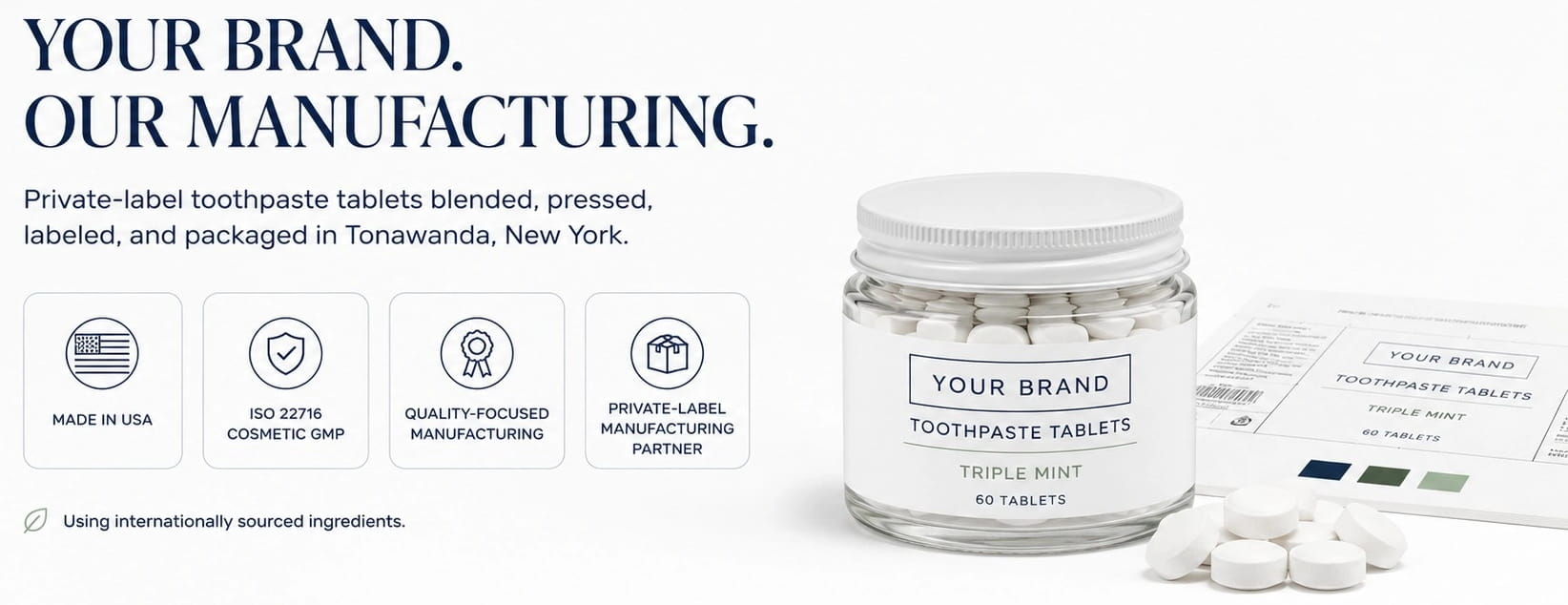 Glass jar of branded toothpaste tablets